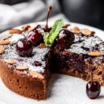 Kirsch Schokokuchen mit Mandelkruste – Der perfekte saftige Genuss First Image First Image